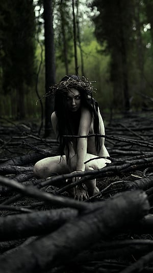 Embrace the Enchanted Cinder Forest: A Playful Tease from Erinthul’s Latest Shoot