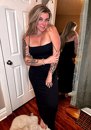 Is this church wife sexy in her black dress?'