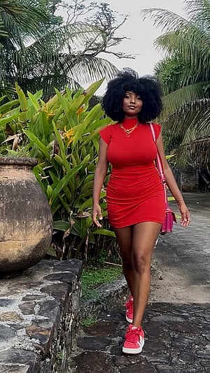 Red Hot Curve Alert: Black Beauty in a Fiery Dress