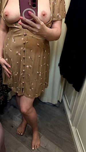 Dressing Room Tease: Boobs Worth Peeking At